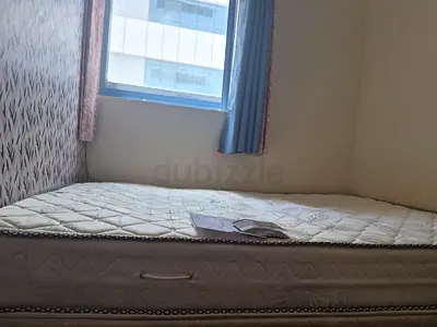 Double spring mattress in good condition with 5 years warranty, few months use- white,