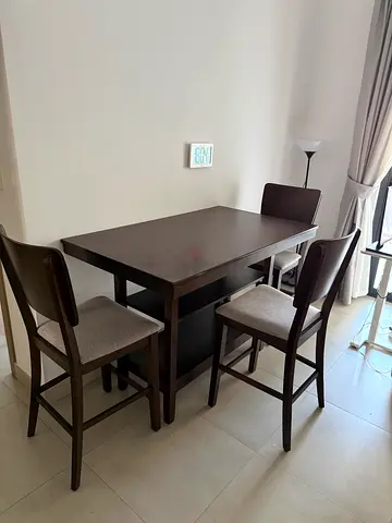Dark wood dining table with 3 upholstered chairs - exellent condition