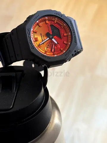 Casio G-Shock GA-2100 style orange dial - rugged sport watch