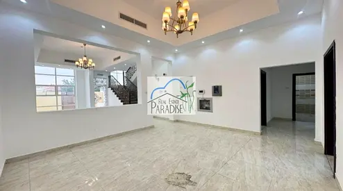 deluxe super new finish private entrance 5 bedroom 3 master central AC ,tv lounge/shared swimming-pool/ maids room /4 parking space/for rent in mirdif