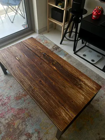 Coffee table with solid aged wood