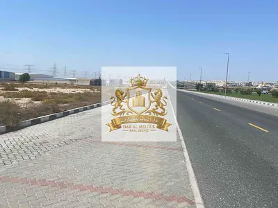 For sale in Sharjah Industrial Area 18, a commercial industrial land with an area of ​​12,900 feet, an industrial commercial permit, the land is on t