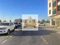 Two commercial/residential plots of land for sale in Muwailih Commercial Area – Al Falah Camp