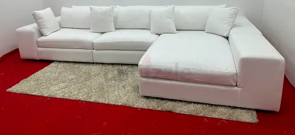 Looks great condition eichholtz brand white color lshape sofa