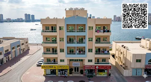 🌊🏢 للبيع بناية استثمارية في الشارقة – منطقة القليعة | إطلالة بحرية وعائد متزايد