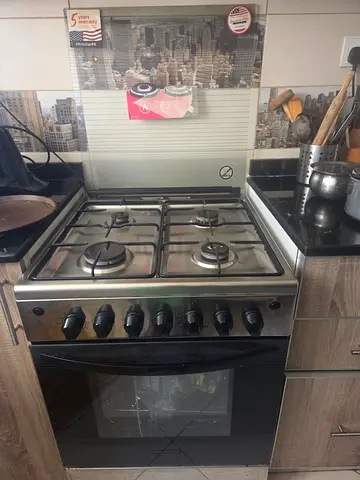 Stainless Steel 4-Burner Gas Cooker with Oven - Good Condition