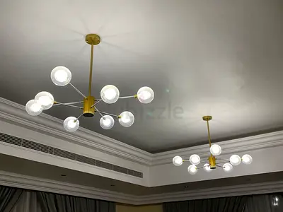 Pair of Modern Globe Chandeliers - Gold Finish