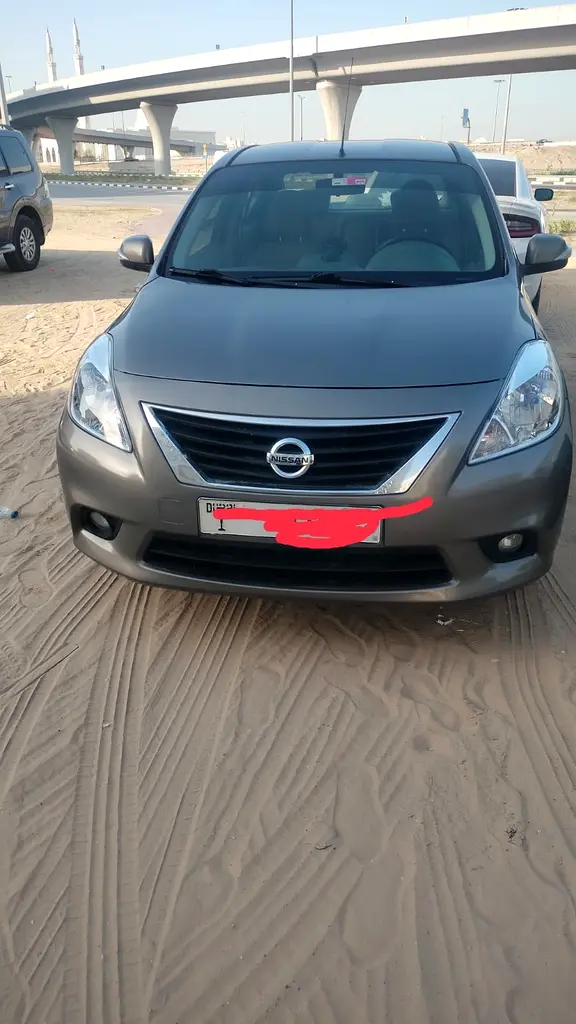 Nissan Sunny 2012 — photo 1 of 3