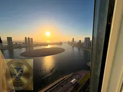 Two bedrooms and a living room in Al Khan overlooking Al Mamzar Lake furnished parking balcony spaci