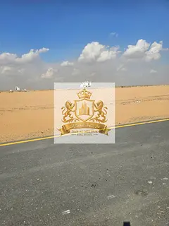 For Sale in Sharjah Rawdat Al Qurt Area Residential Investment Land Near Khor Fakkan Road Freehold f