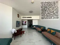 A great opportunity to own a spacious apartment in one of Ajman's most famous towers, with an op