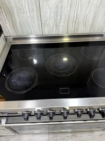 Bompani Used Stainless Steel Ceramic Glass Hob with 5 Burners, working properly