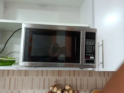 URGENT SALE - Used stainless steel microwave oven - good working condition