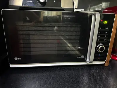 LG WaveDoor Countertop Microwave Oven - Excellent Working Condition