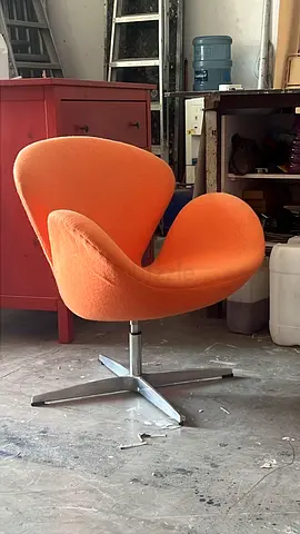 Orange Swivel Accent Chair — Modern Tulip-style Lounge Chair