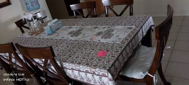 Solid wood 6-seater dining table with chairs if sure buyer negotiate