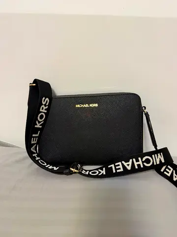 Brand new original Micheal kors sling bag