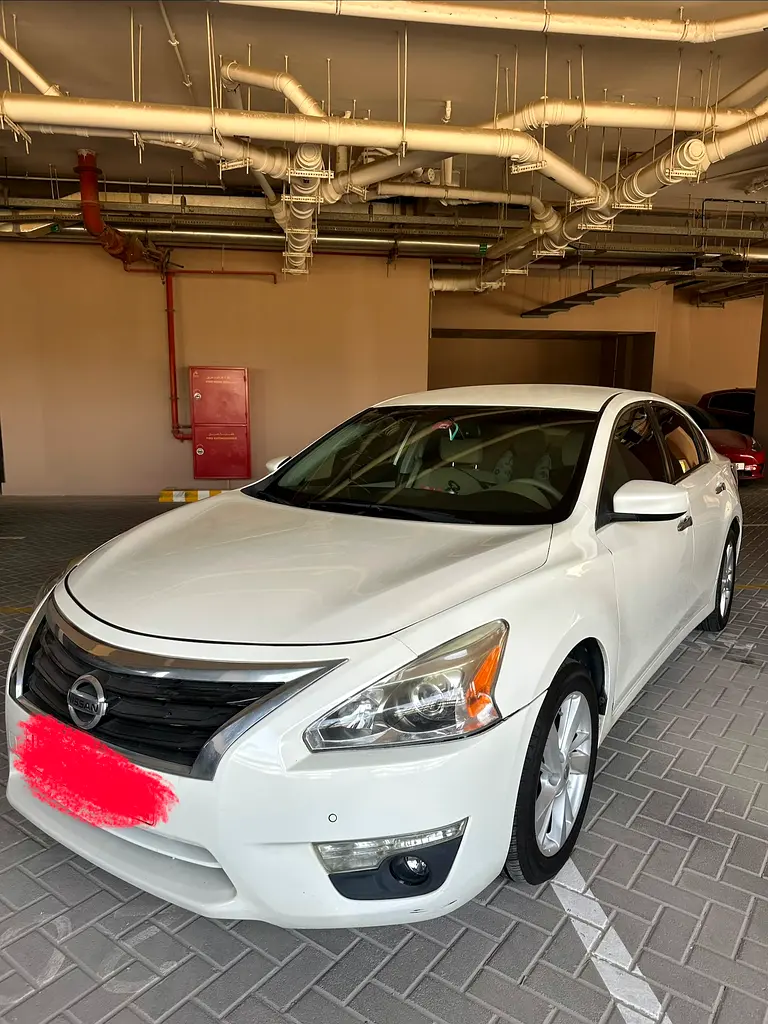 Nissan Altima 2015 — photo 1 of 8