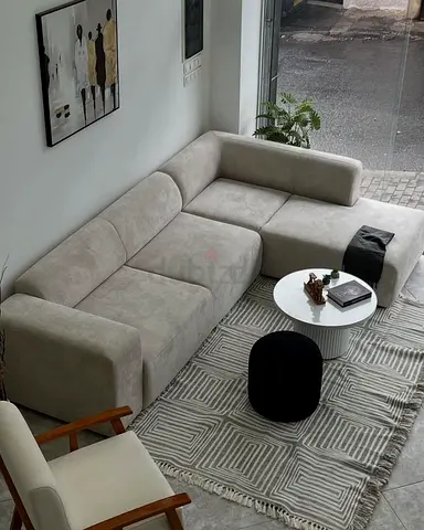 Light grey L-shaped modern sectional sofa - 3-seater with chaise