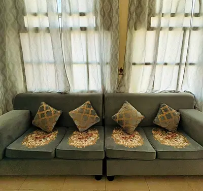 Grey 12 seater sofa set with cushions - and 1 Tea table -good condition