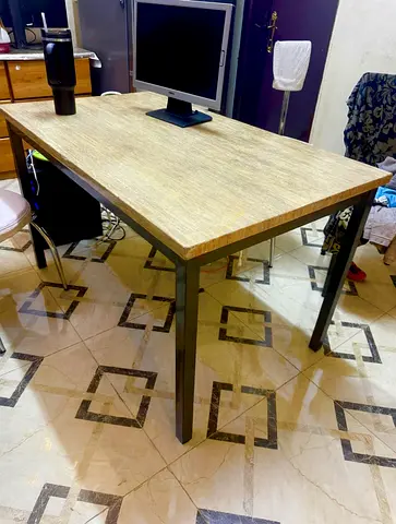 Sturdy industrial-style wooden office table with metal legs