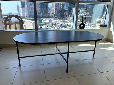 Solid Black Oval coffee Table with Metal Frame - 40cm height - Good Condition