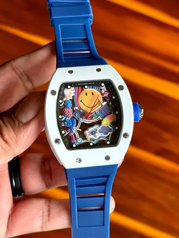 RM Blue rubber strap wristwatch with playful smiley dial — preowned