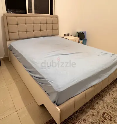 Modern Bed with Tufted Fabric Headboard
