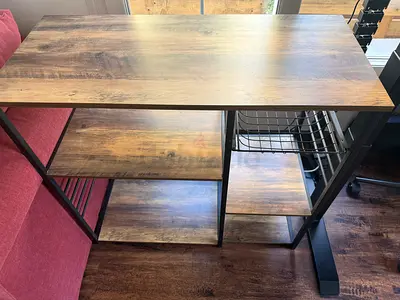 Industrial-style wooden shelving unit with metal frame - 4 tiers