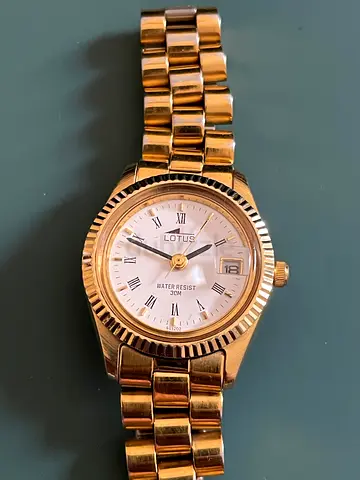Gold-tone Lotus wristwatch with date display -