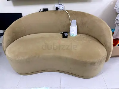 Beige Curved Two-Seater Sofa - Good Condition
