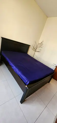 Queen bed with mattress and side table @250