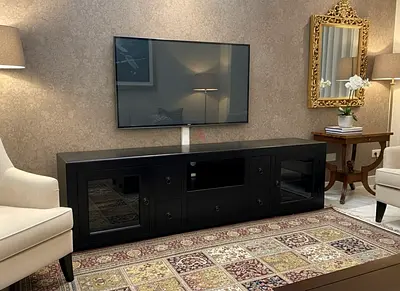 Black Wooden Entertainment Center with Glass Doors and Drawers