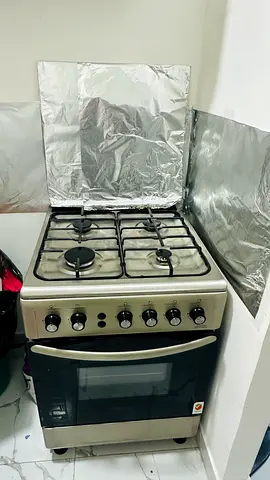 Used 4-Burner Gas Stove with Oven - Good Working Condition
