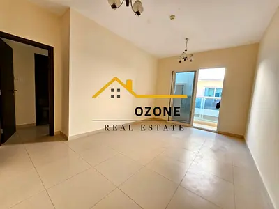 Wow in school area 12 Cheques Payment 2bhk with balcony free coverd parking cantral ac good location easy exit to dubai