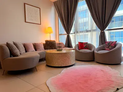 Light grey sofa with ottoman and Coffee table — good condition