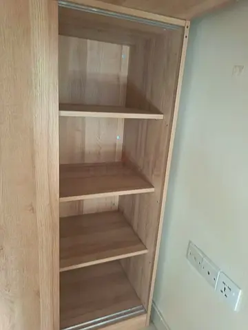 Light wood wardrobe/armoire with shelves – good condition