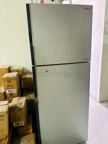 Hitachi Silver Top-Freezer Refrigerator - Good Working Condition and Black + Decker Oven. 350
