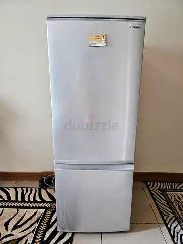 Used double-door refrigerator in good working condition