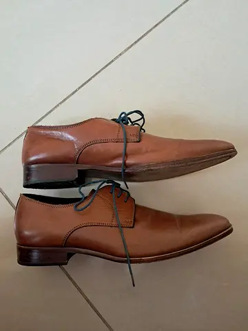 Negotiation allowed. Brown leather mens dress shoes. Orignal price was 265.