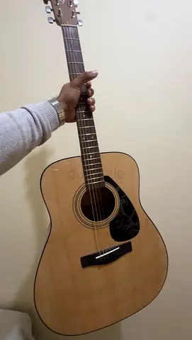 Yamaha F310 guitar. 2 months and unused. Selling due to relocation and no usage