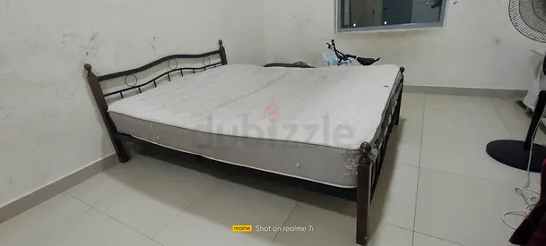 Metal double bed frame with mattress - good condition