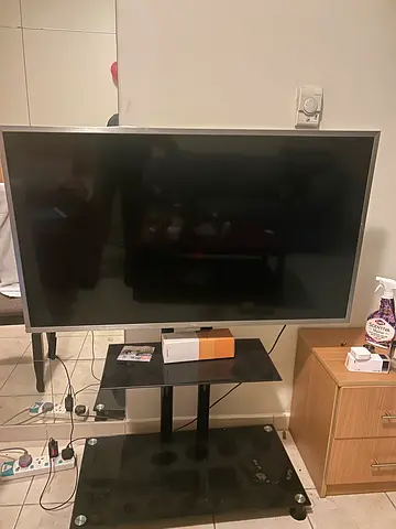 Tv, TV stand, coffee machine, Fridge and Floor lamp on sale