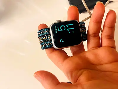 Silver Apple Watch with Patterned Fabric Band SE 40 mm LTE