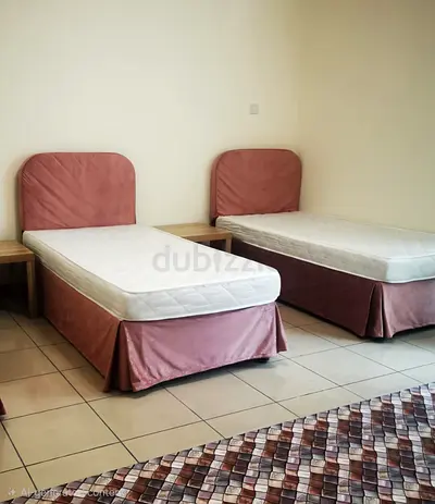 Two single beds with mattresses and headboards - good condition