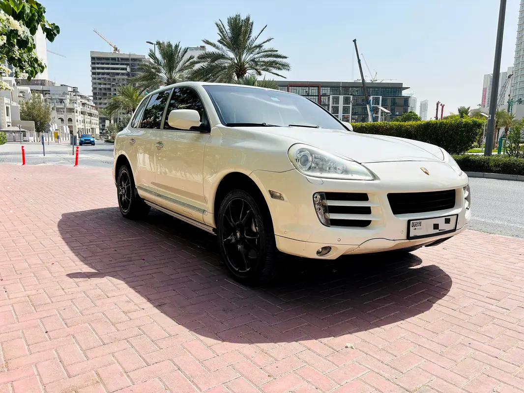 Porsche Cayenne 2009 — photo 1 of 10