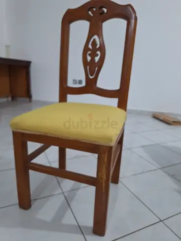 Wooden dining chair with yellow upholstered seat - single piece