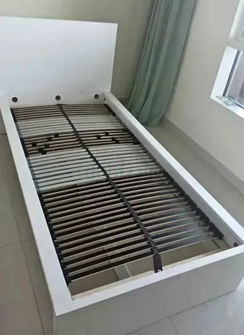 Malam single  bed 90/200cm bed and Ikea mattress is available in excellent condition,