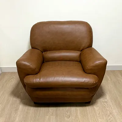 Home Center Comfortable Brown Faux Leather Armchair (1 Month Old)