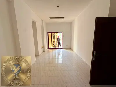 Two BR hall balcony modern finishing spacious layout stylish kitchen central gas prime location near Dubai exit and all services